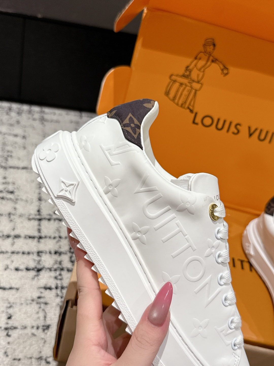 Louis Vuitton Women's White Monogram Embossed Leather Sneakers