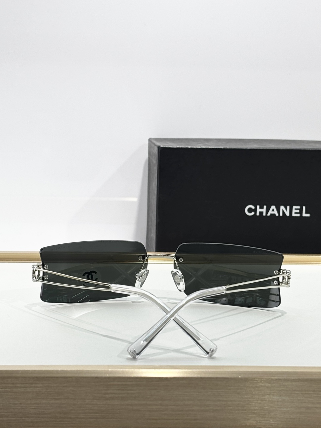Chanel Rimless Rectangular Silver Sunglasses with Rhinestone CC Logo