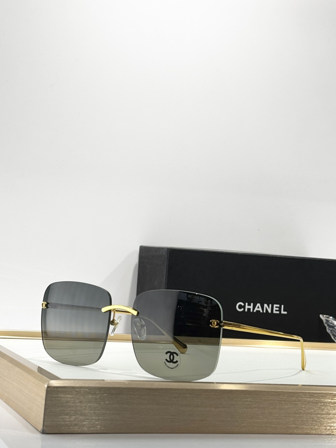 Chanel Luxury Rimless Square Sunglasses - Elegant Designer Eyewear