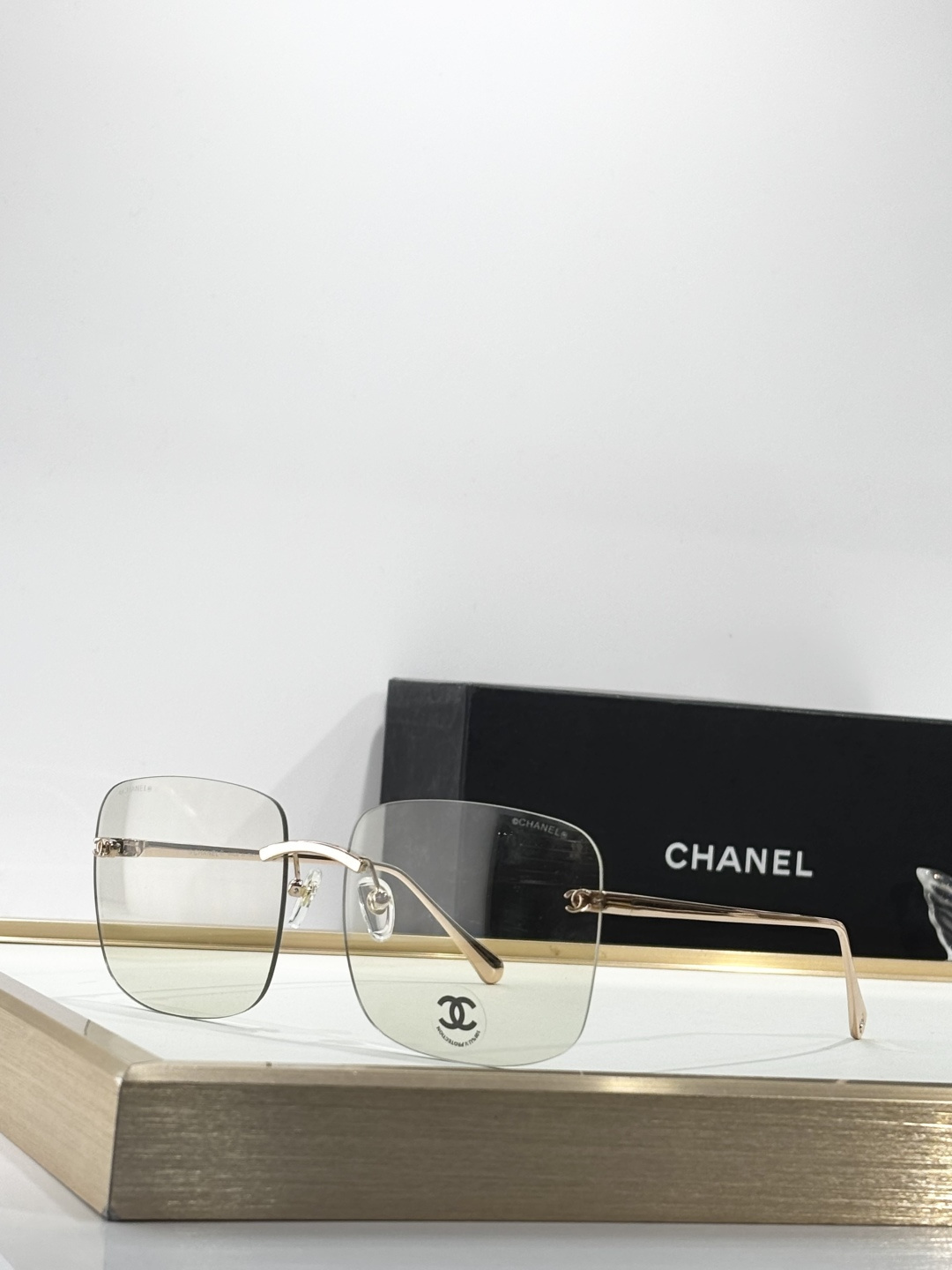 Chanel Luxury Rimless Square Sunglasses - Elegant Designer Eyewear
