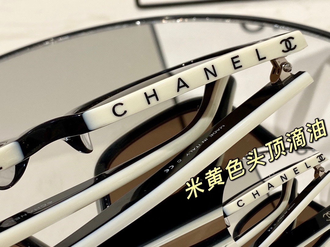 Chanel Luxury Black and White Rectangular Sunglasses with CC Logo