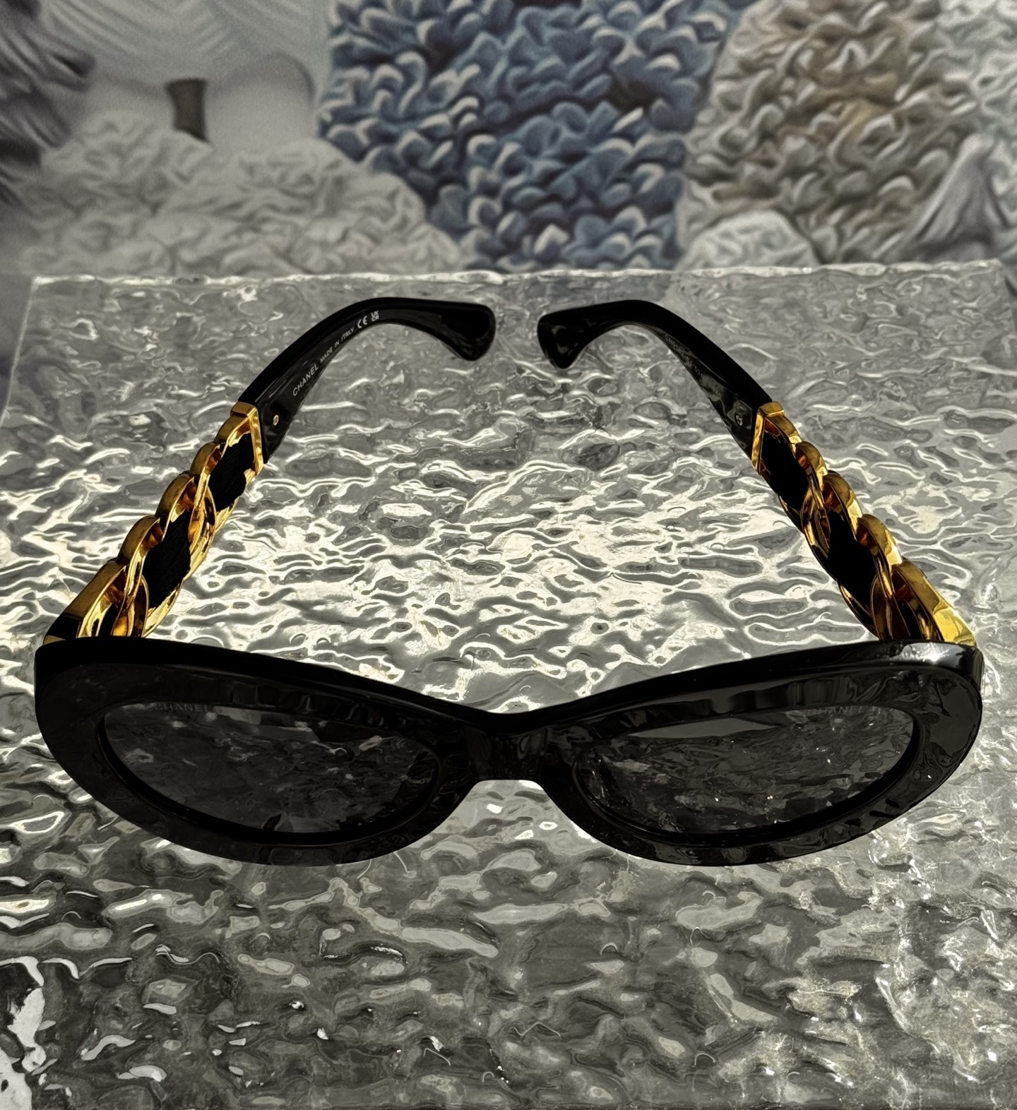 Chanel Luxury Oval Sunglasses - Black with Gold Chain Detail