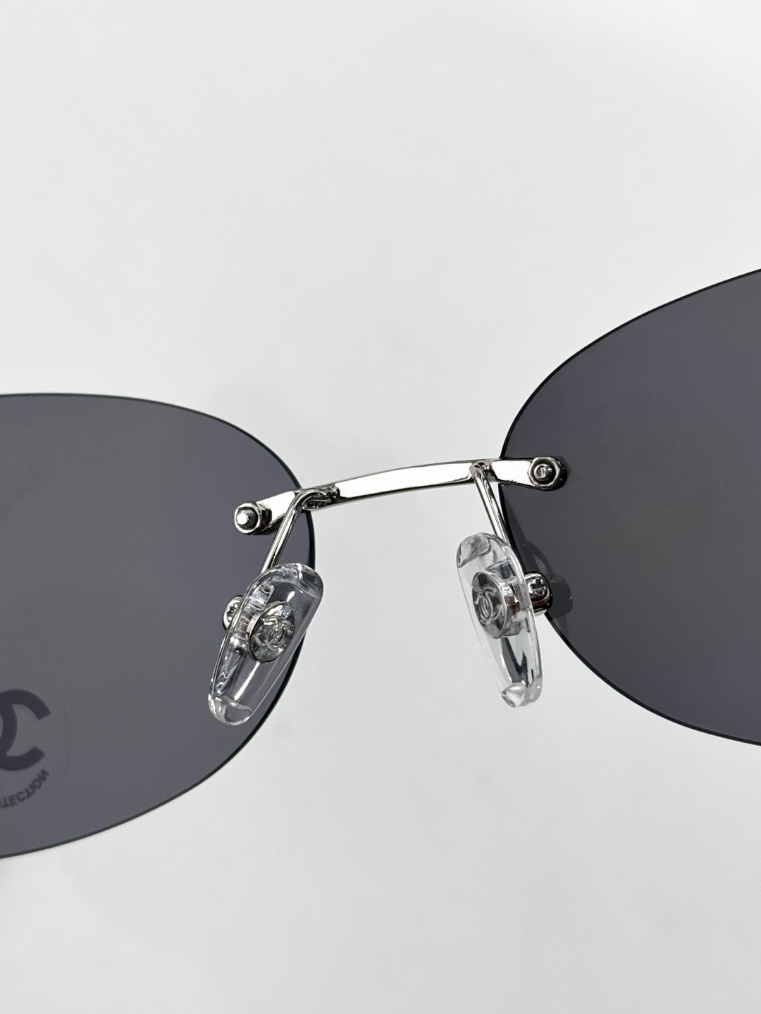 Chanel Rimless Oval Sunglasses with Rhinestone CC Logo