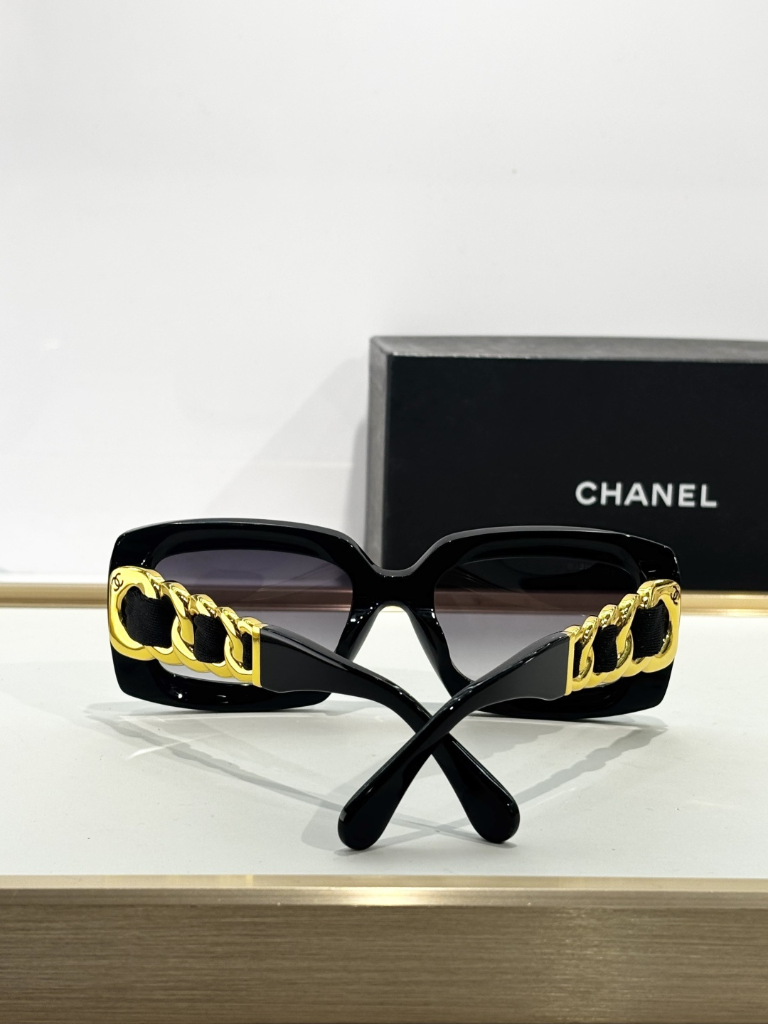 Chanel Luxury Square Sunglasses with Gold Chain Link Detail