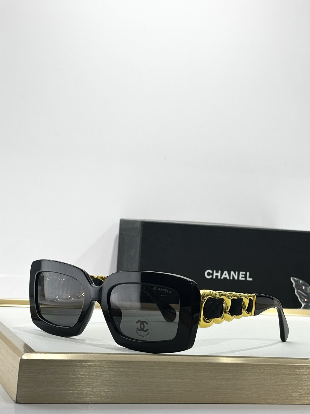 Chanel Luxury Square Sunglasses with Gold Chain Link Detail