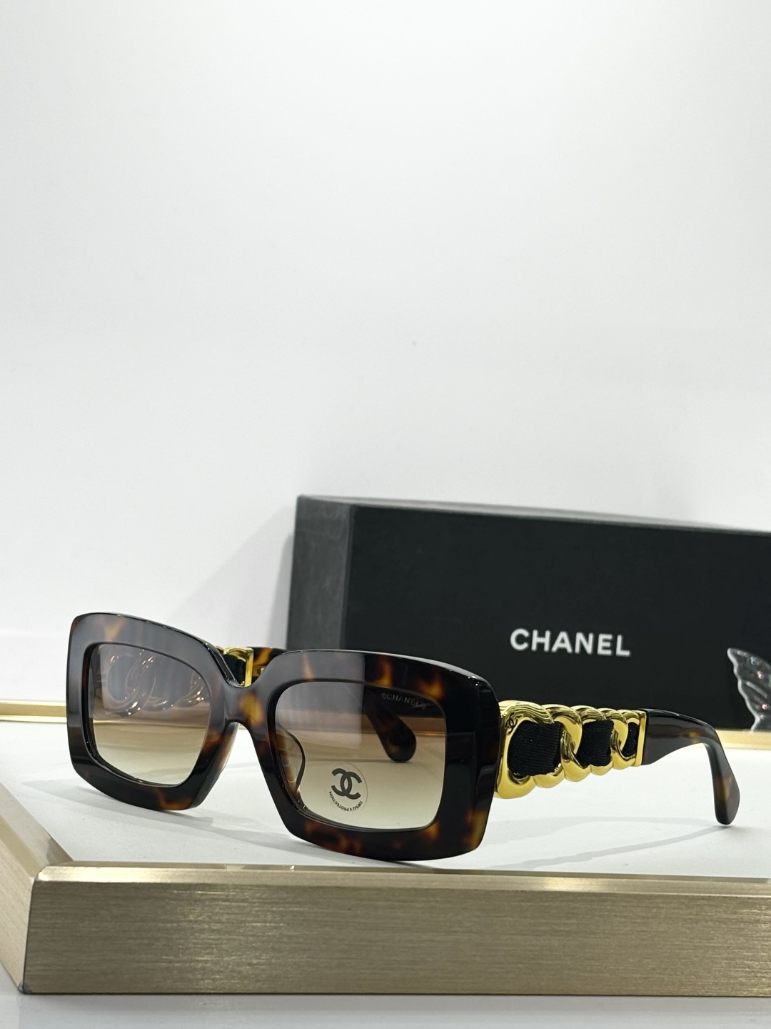 Chanel Luxury Square Sunglasses with Gold Chain Link Detail