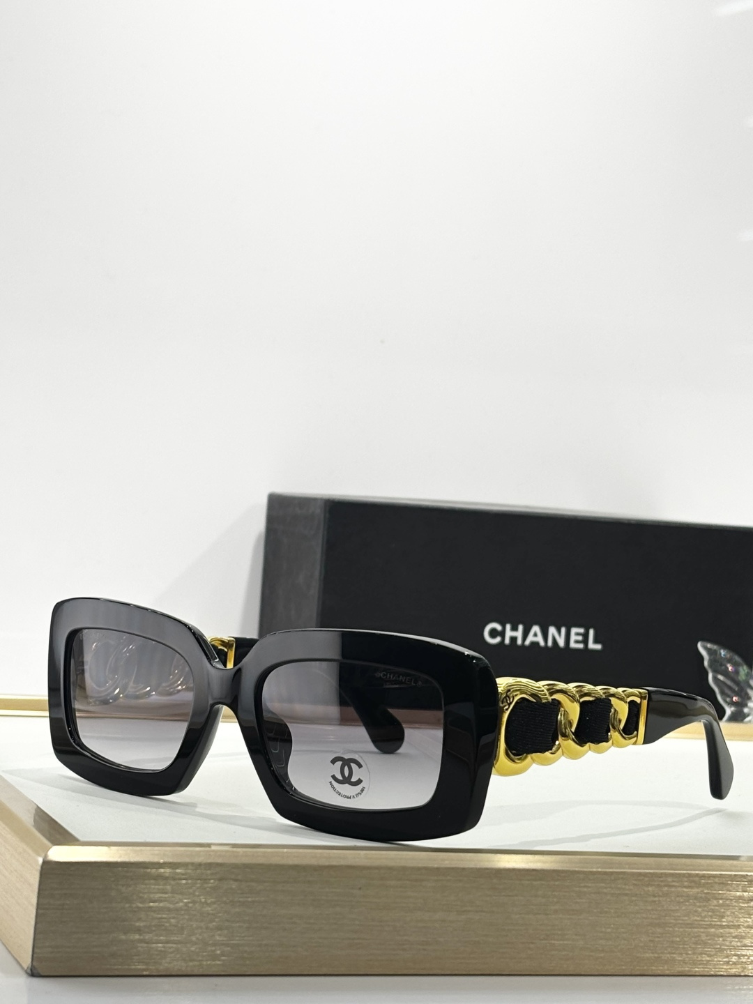 Chanel Luxury Square Sunglasses with Gold Chain Link Detail