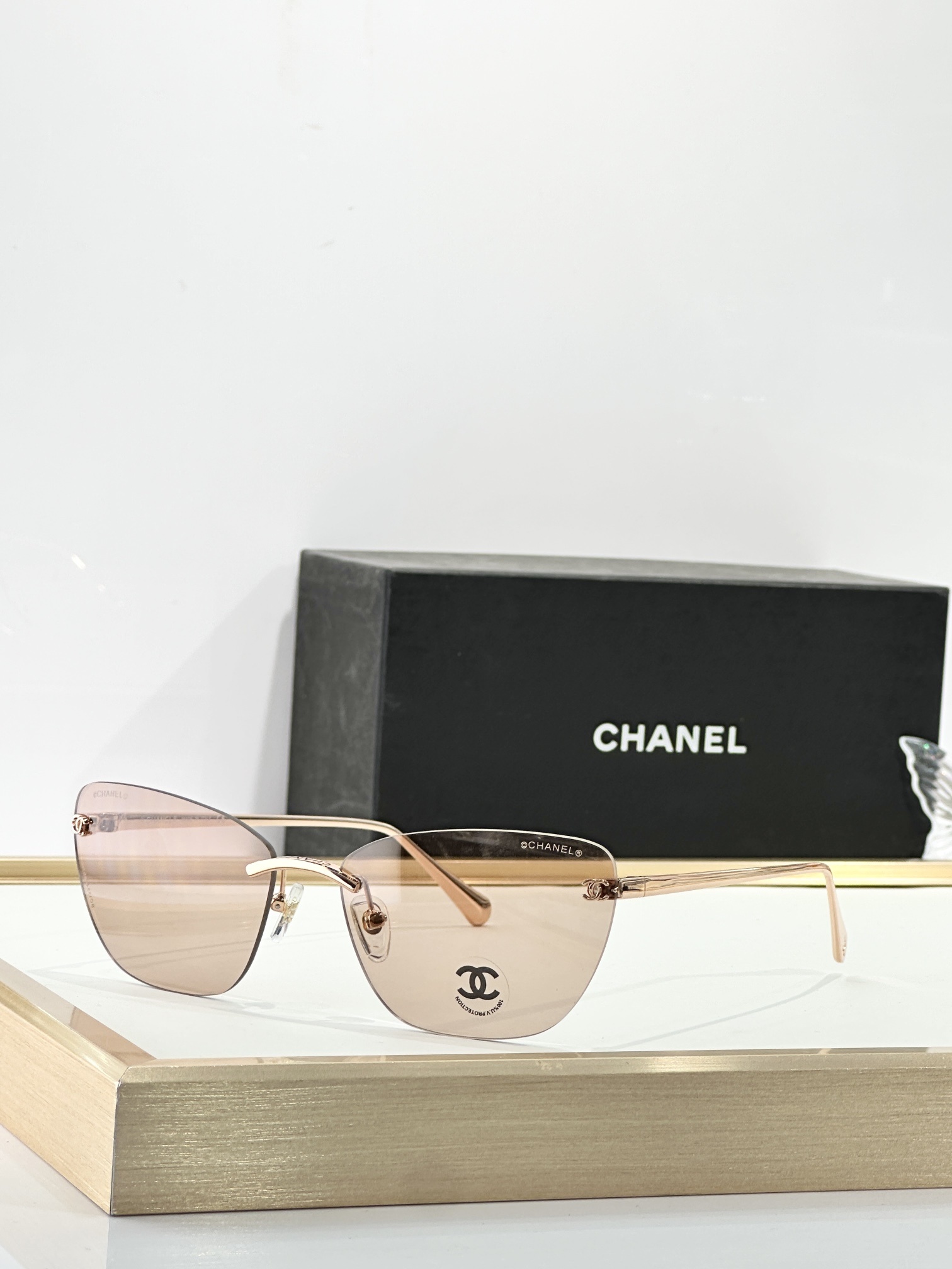 Chanel Luxury Rimless Butterfly Sunglasses - Premium CC Logo Design