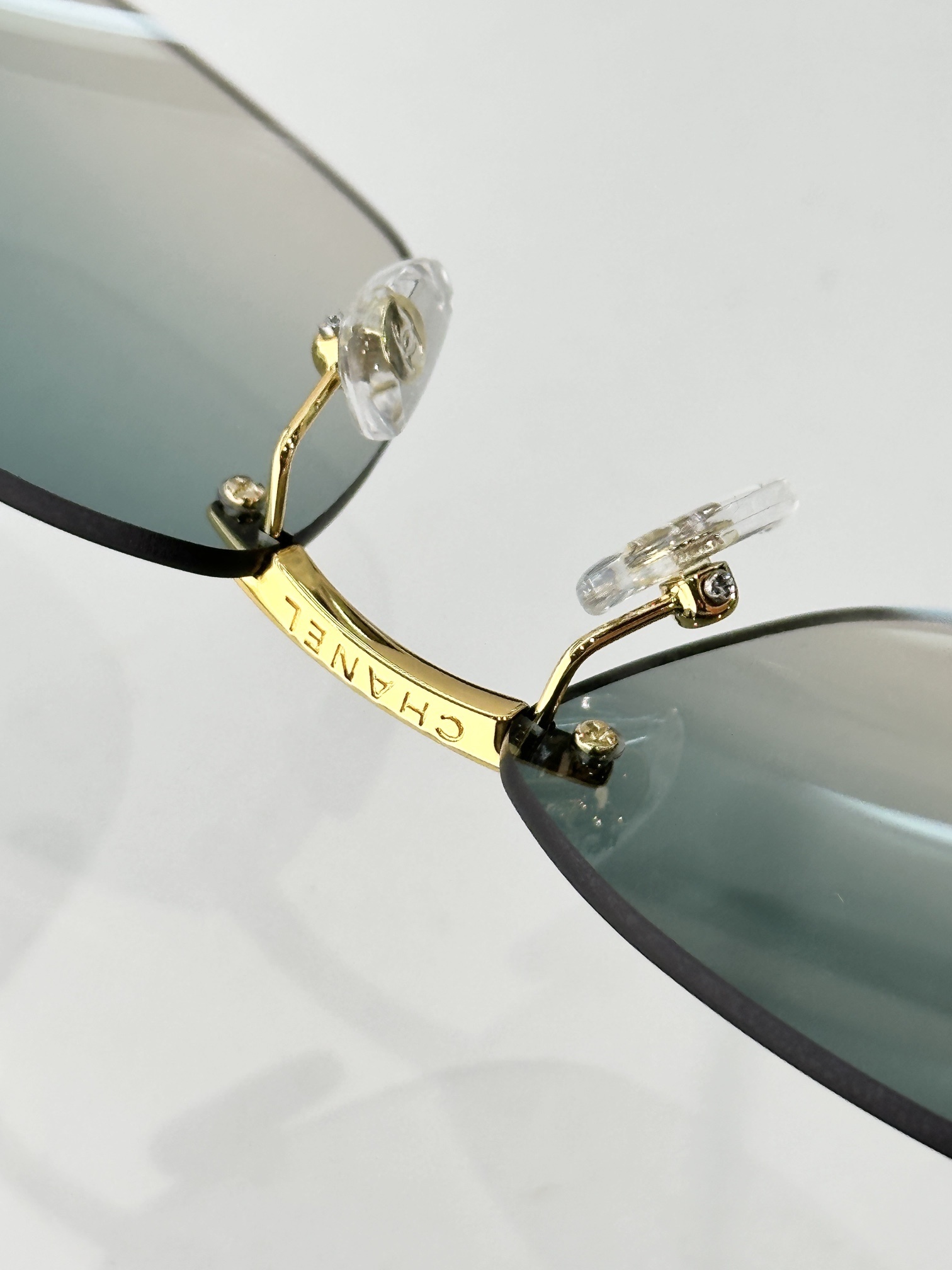 Chanel Luxury Rimless Sunglasses - Gold Frame & Gradient Lenses