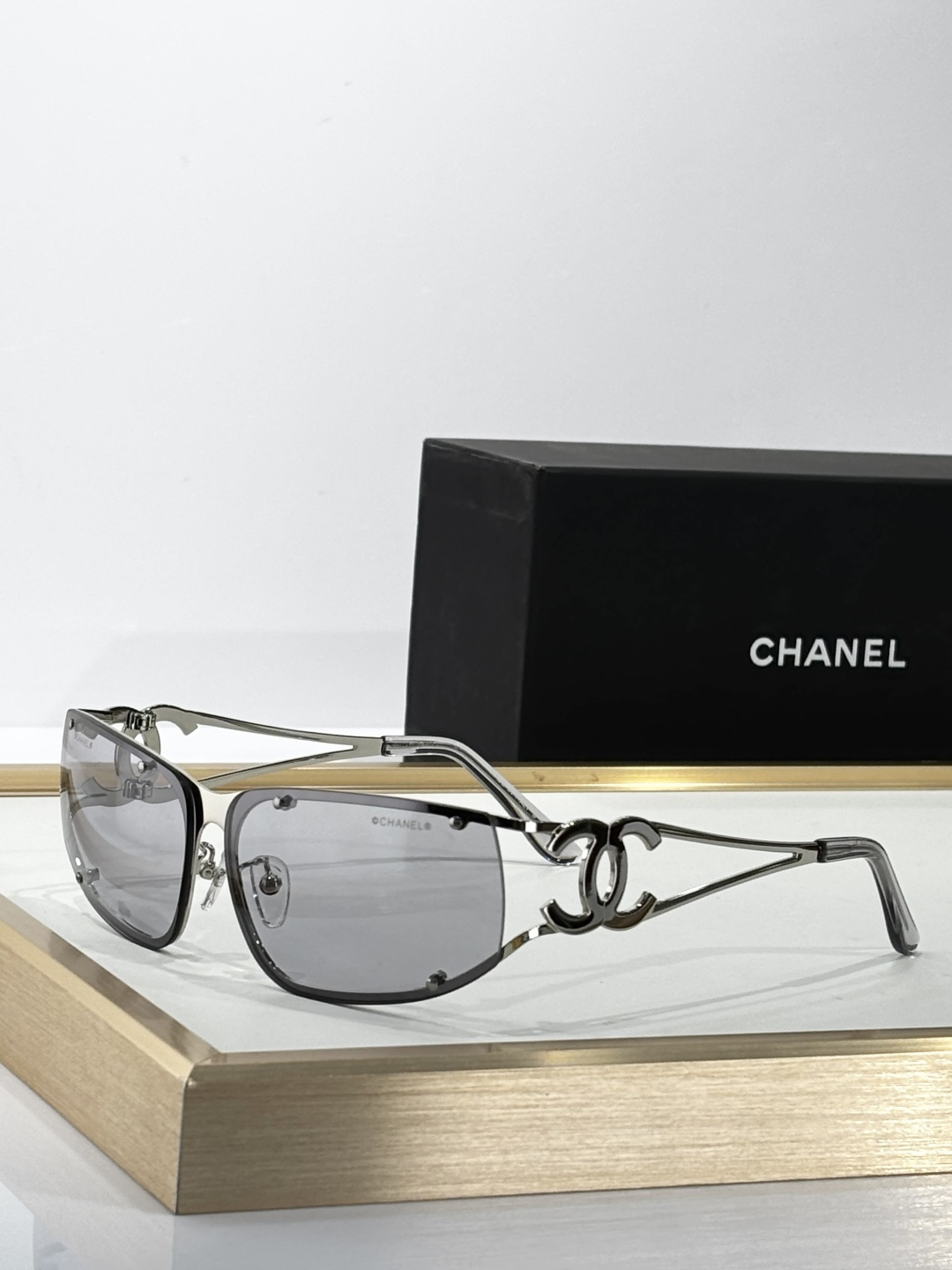 Luxury Chanel Women's Sunglasses - Elegant CC Logo Shield Design