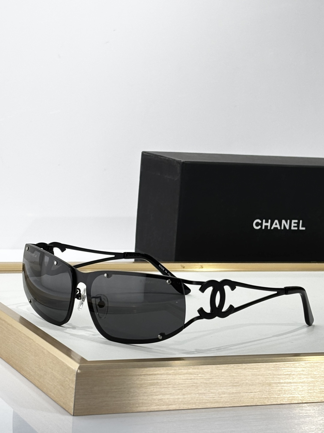 Luxury Chanel Women's Sunglasses - Elegant CC Logo Shield Design