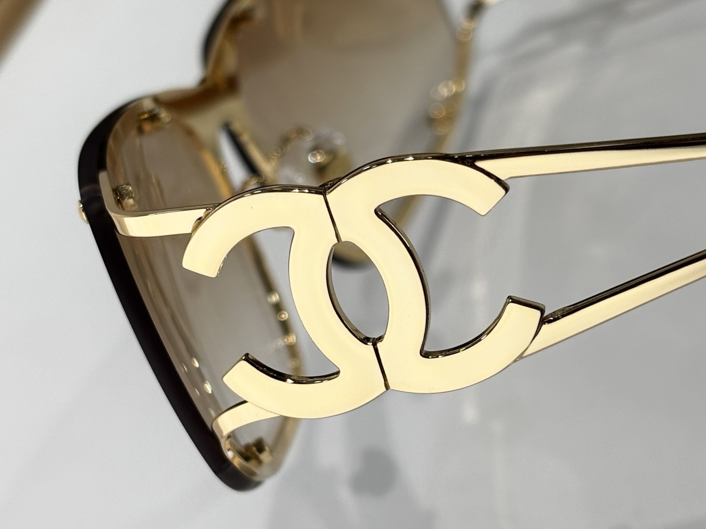 Chanel Gold Shield Sunglasses with Brown Gradient Lenses & CC Logo