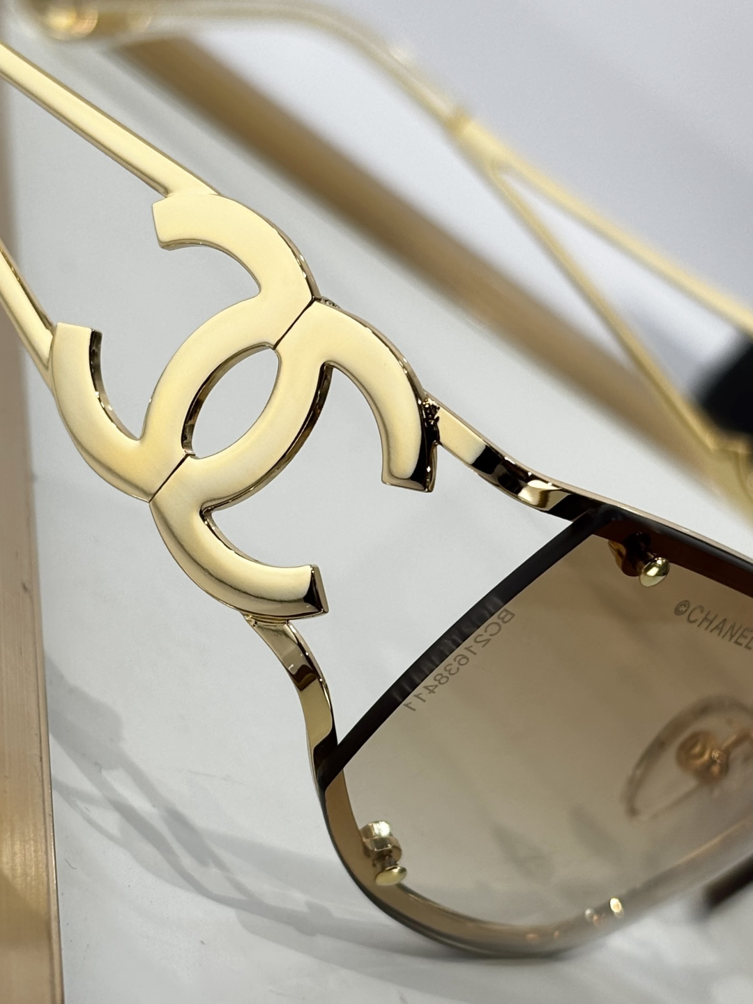 Chanel Gold Shield Sunglasses with Brown Gradient Lenses & CC Logo