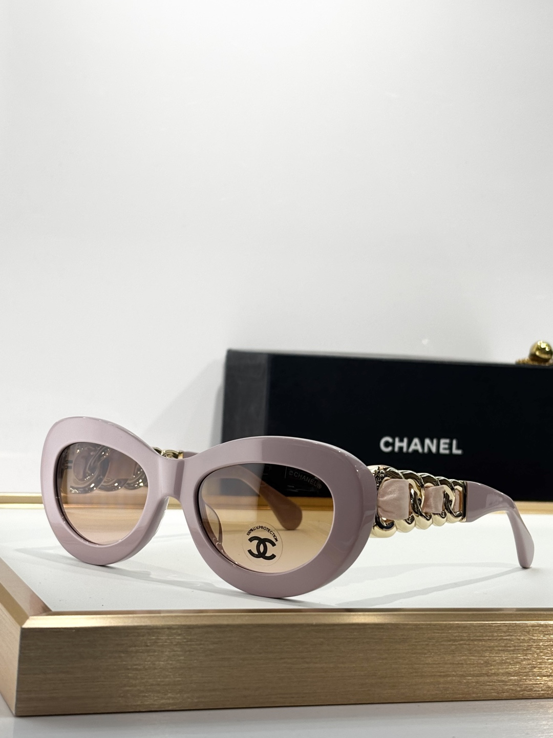 Chanel Luxury Oval Sunglasses with Gold Chain Link Arms