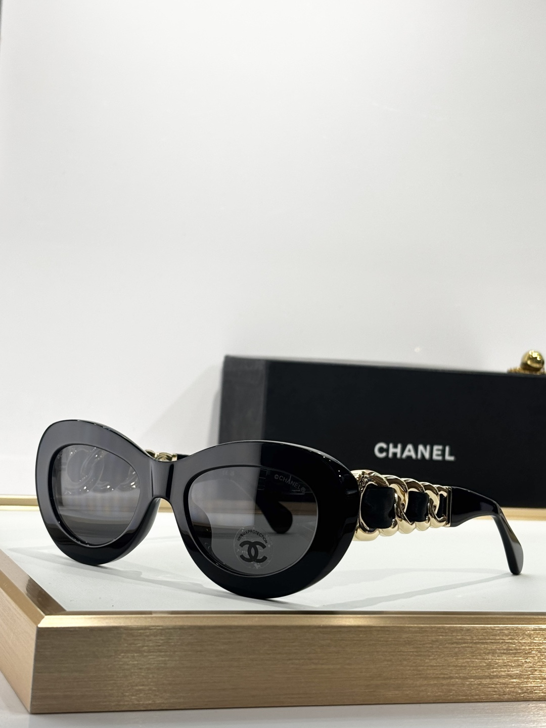 Chanel Luxury Oval Sunglasses with Gold Chain Link Arms
