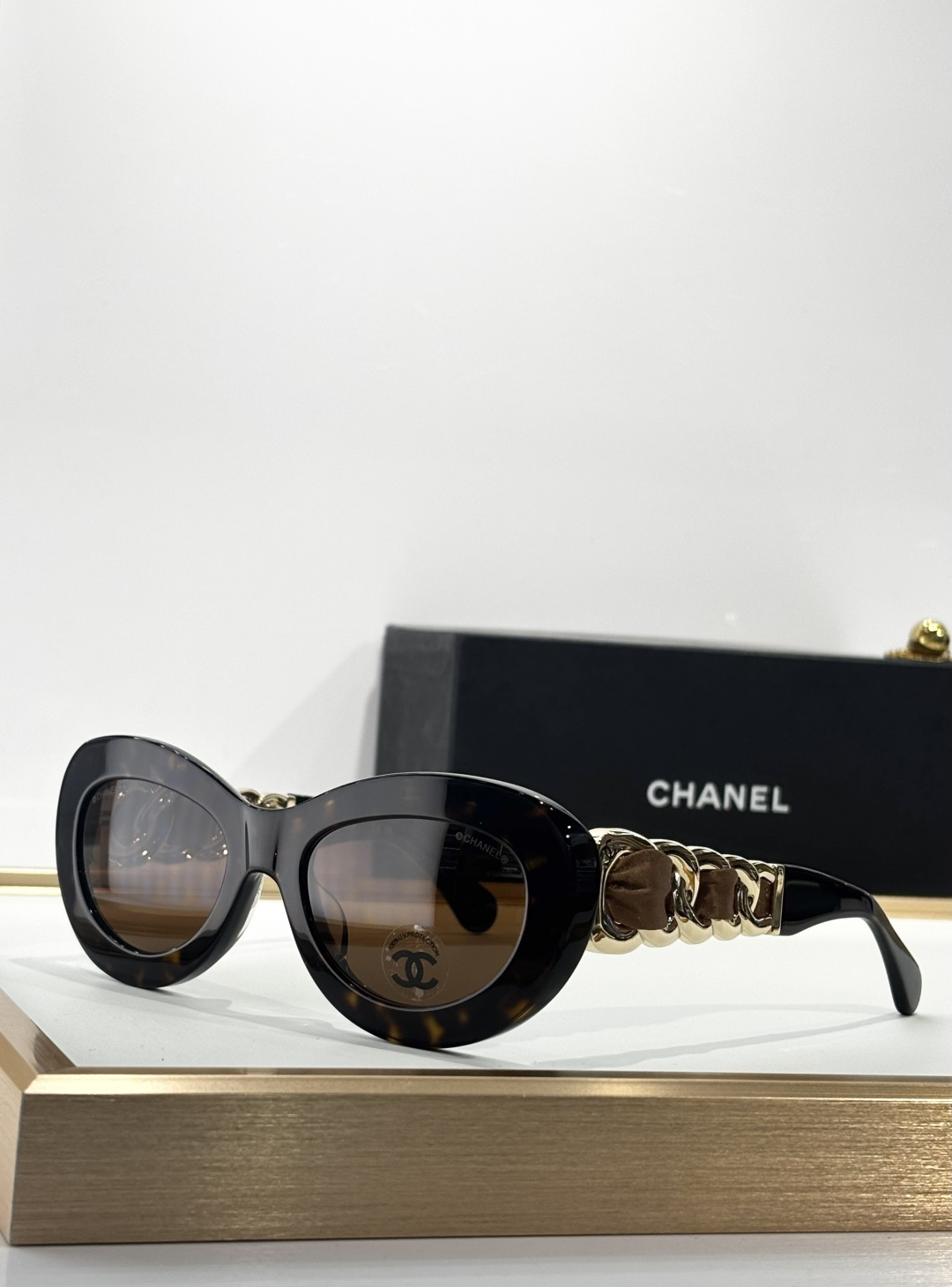 Chanel Luxury Oval Sunglasses with Gold Chain Link Arms