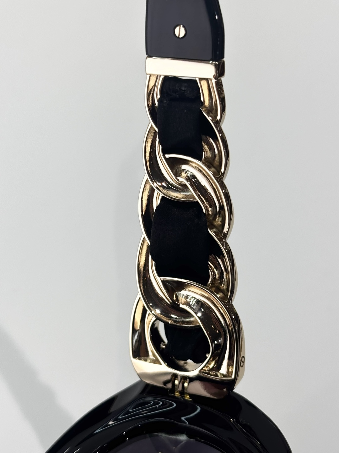 Chanel Luxury Oval Sunglasses - Black Frame with Gold Chain Detail