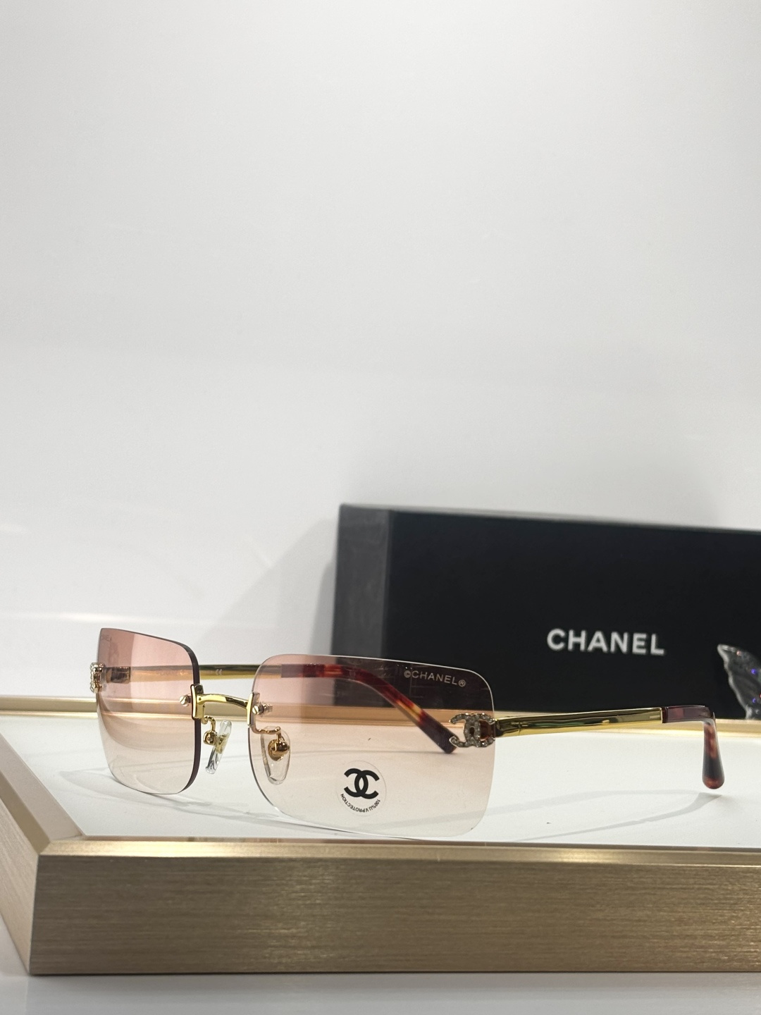 Luxury Chanel Rimless Sunglasses - Crystal CC Logo Gradient