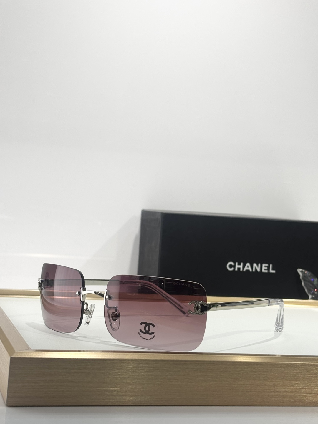 Luxury Chanel Rimless Sunglasses – Crystal CC Logo Gradient