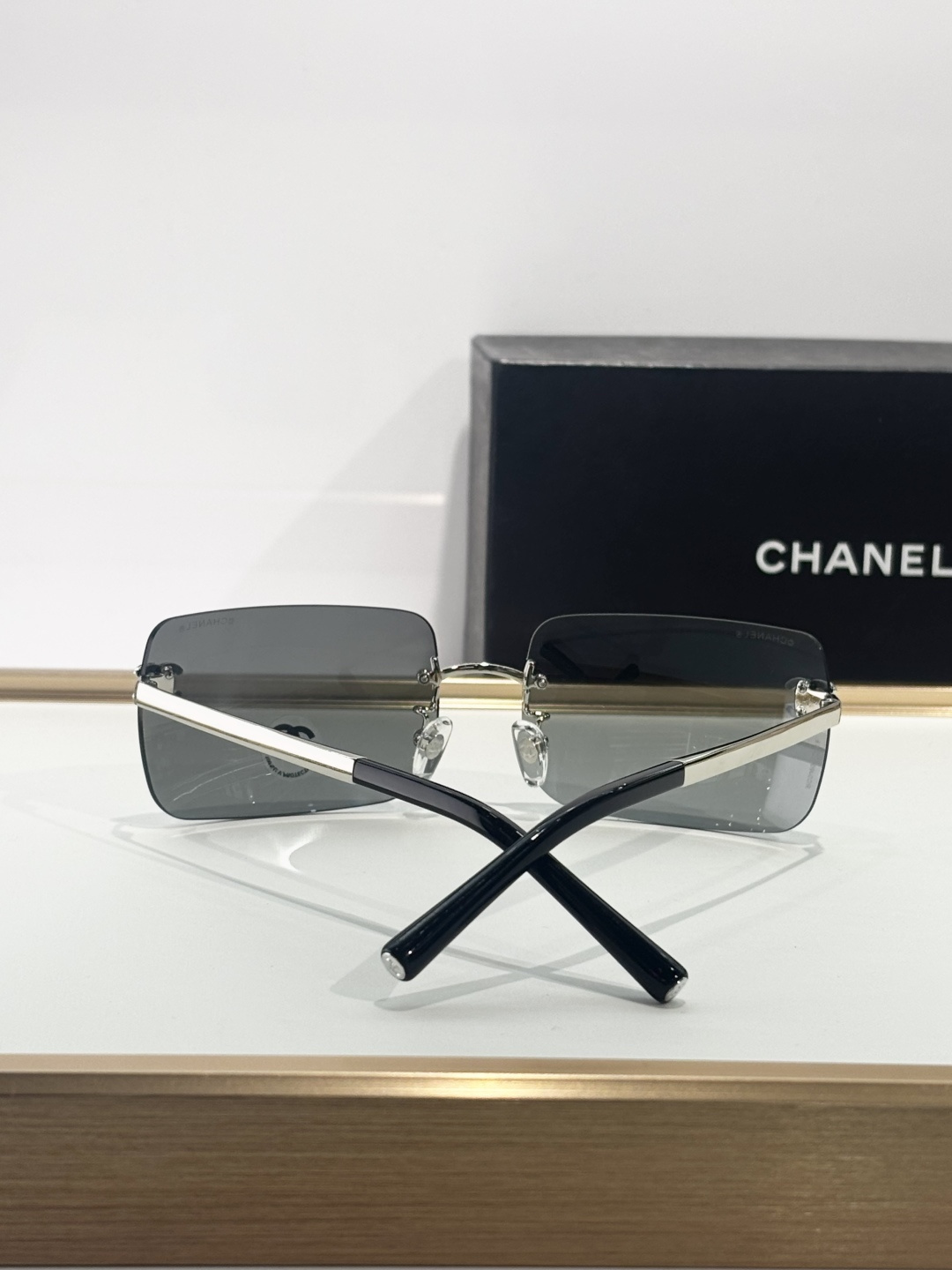 Chanel Rimless Square Sunglasses with Crystal CC Logo - Silver