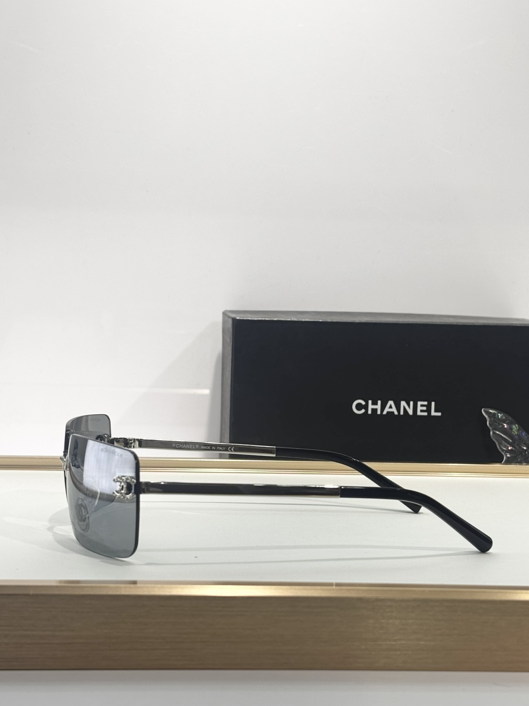 Chanel Rimless Square Sunglasses with Crystal CC Logo - Silver