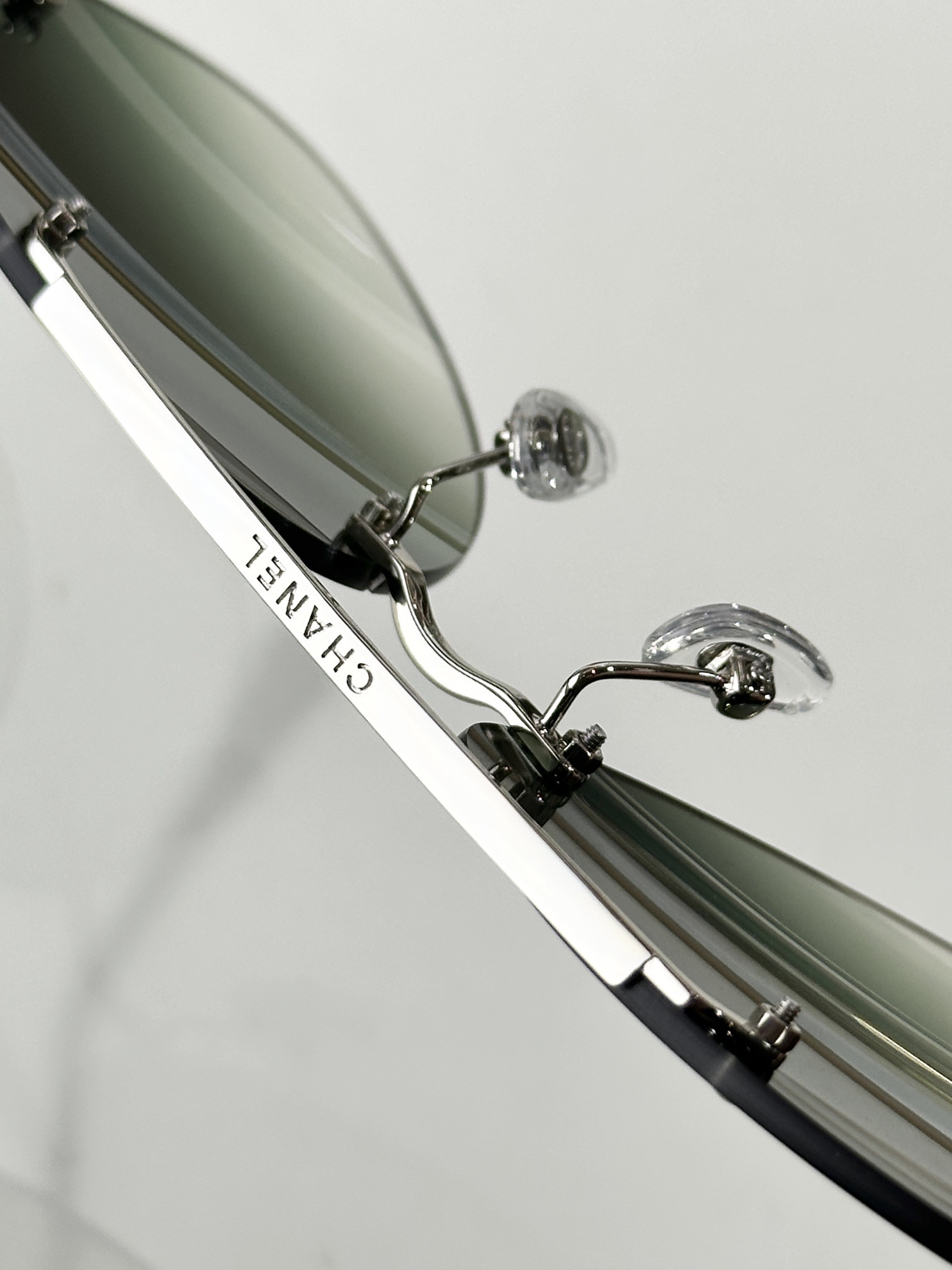 Chanel Luxury Rimless Aviator Eyewear - Elegant CC Logo Design