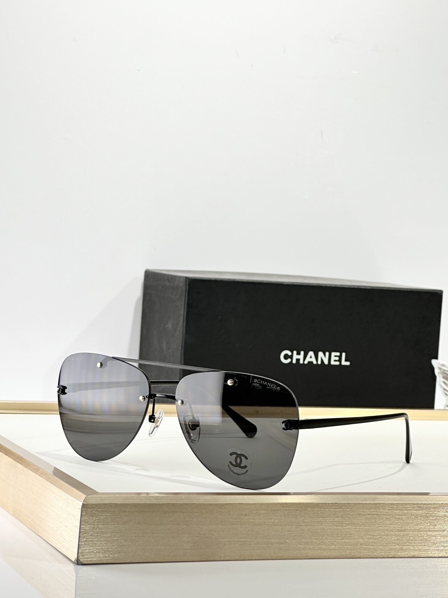 Chanel Luxury Rimless Aviator Eyewear - Elegant CC Logo Design