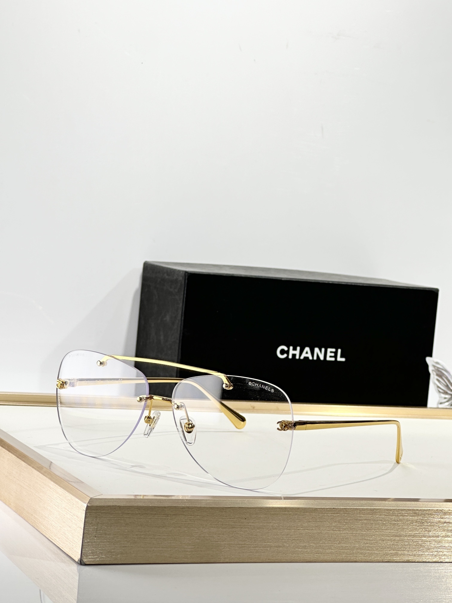 Chanel Luxury Rimless Aviator Eyewear - Elegant CC Logo Design