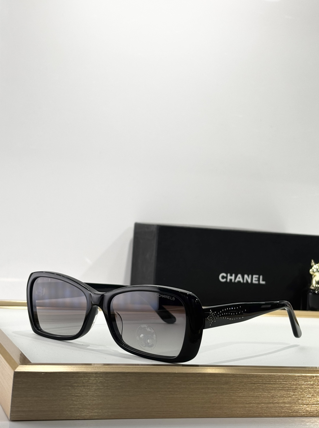 Chanel Luxury Rectangular Eyeglasses with Crystal Temple Detail