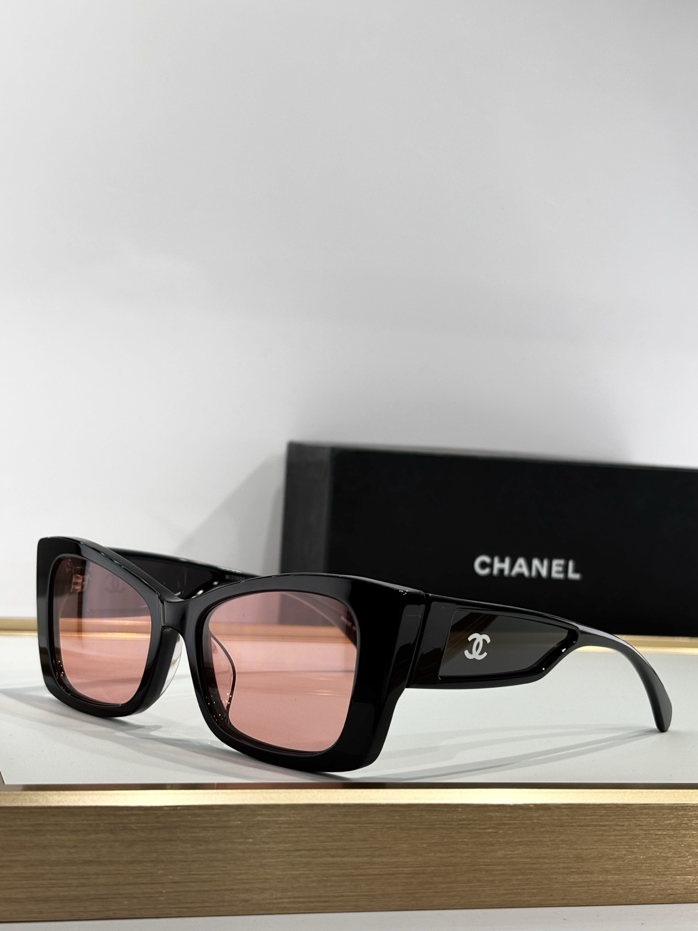 Chanel Luxury Butterfly Sunglasses – Elegant Black Frame & Tinted Lenses
