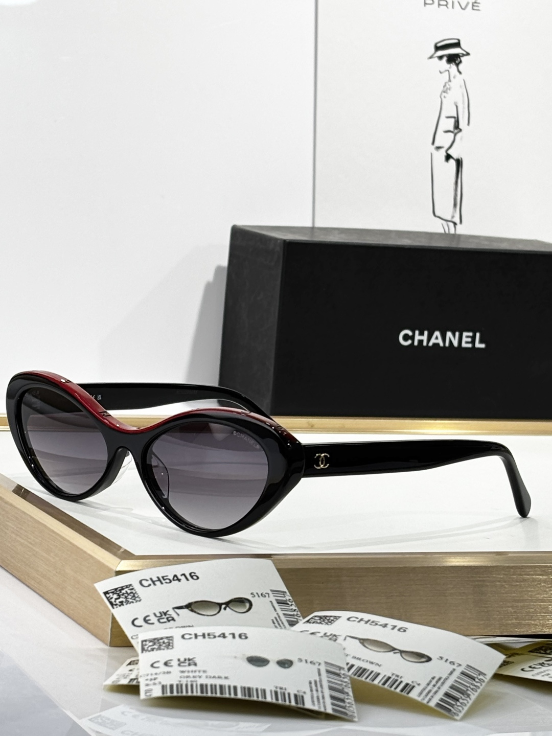 Chanel Oval Sunglasses in Black and Red Acetate Luxury Eyewear