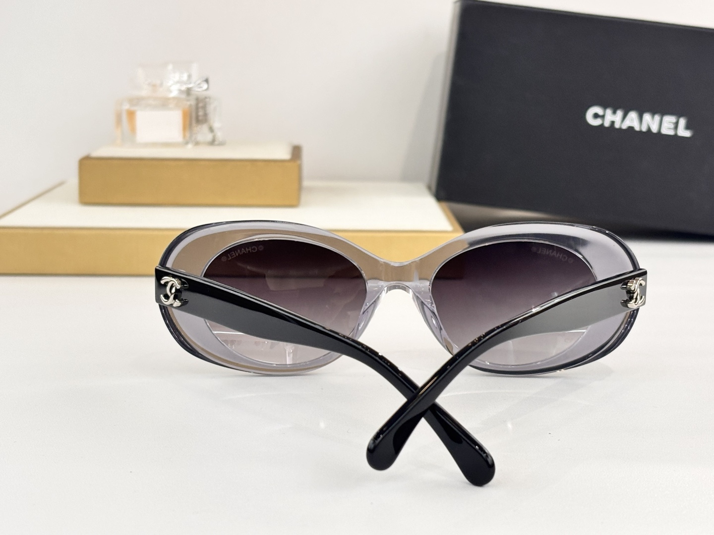 Chanel Luxury Oval Sunglasses - Elegant Women's Designer Eyewear