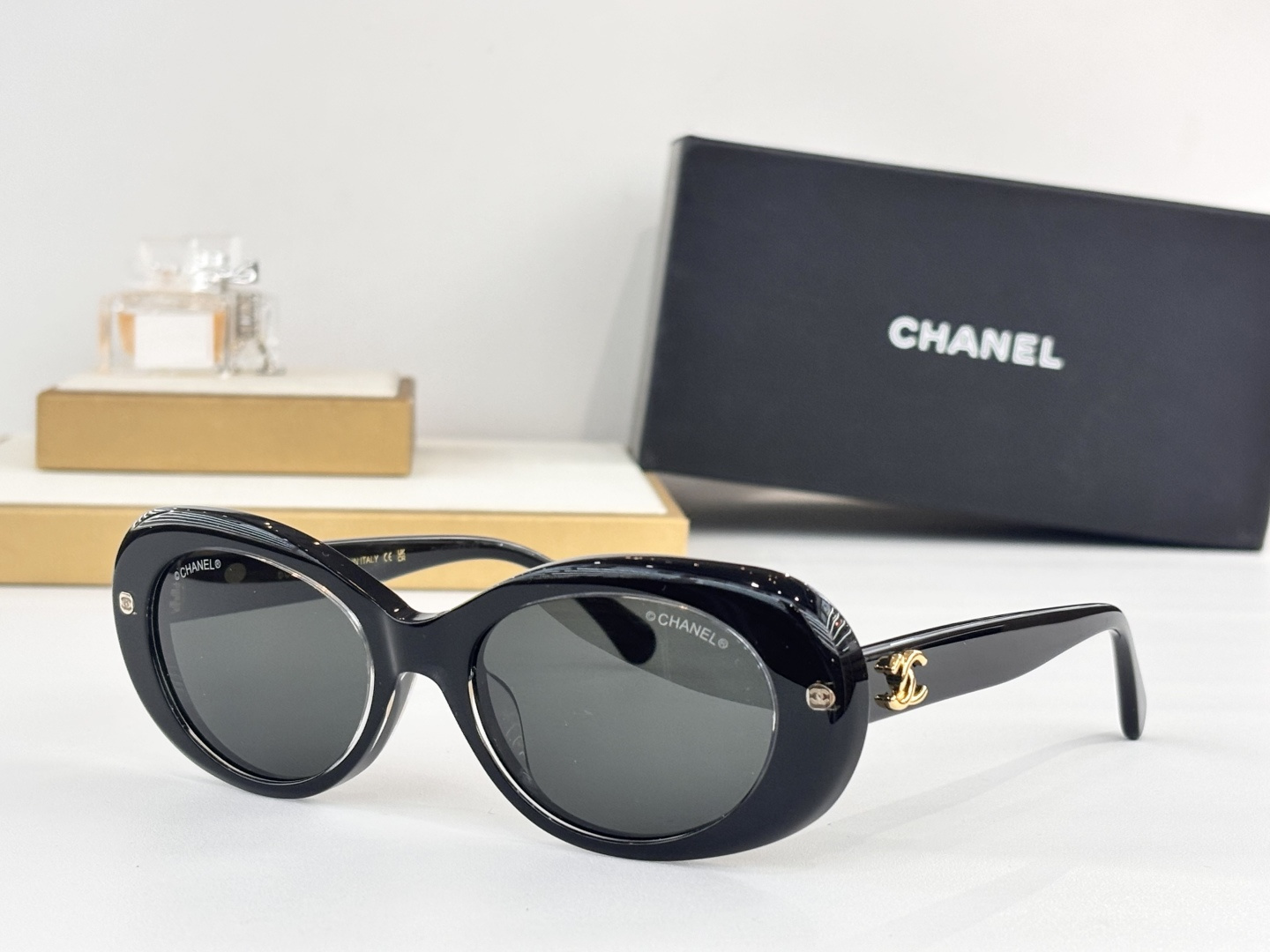 Chanel Luxury Oval Sunglasses - Elegant Women's Designer Eyewear