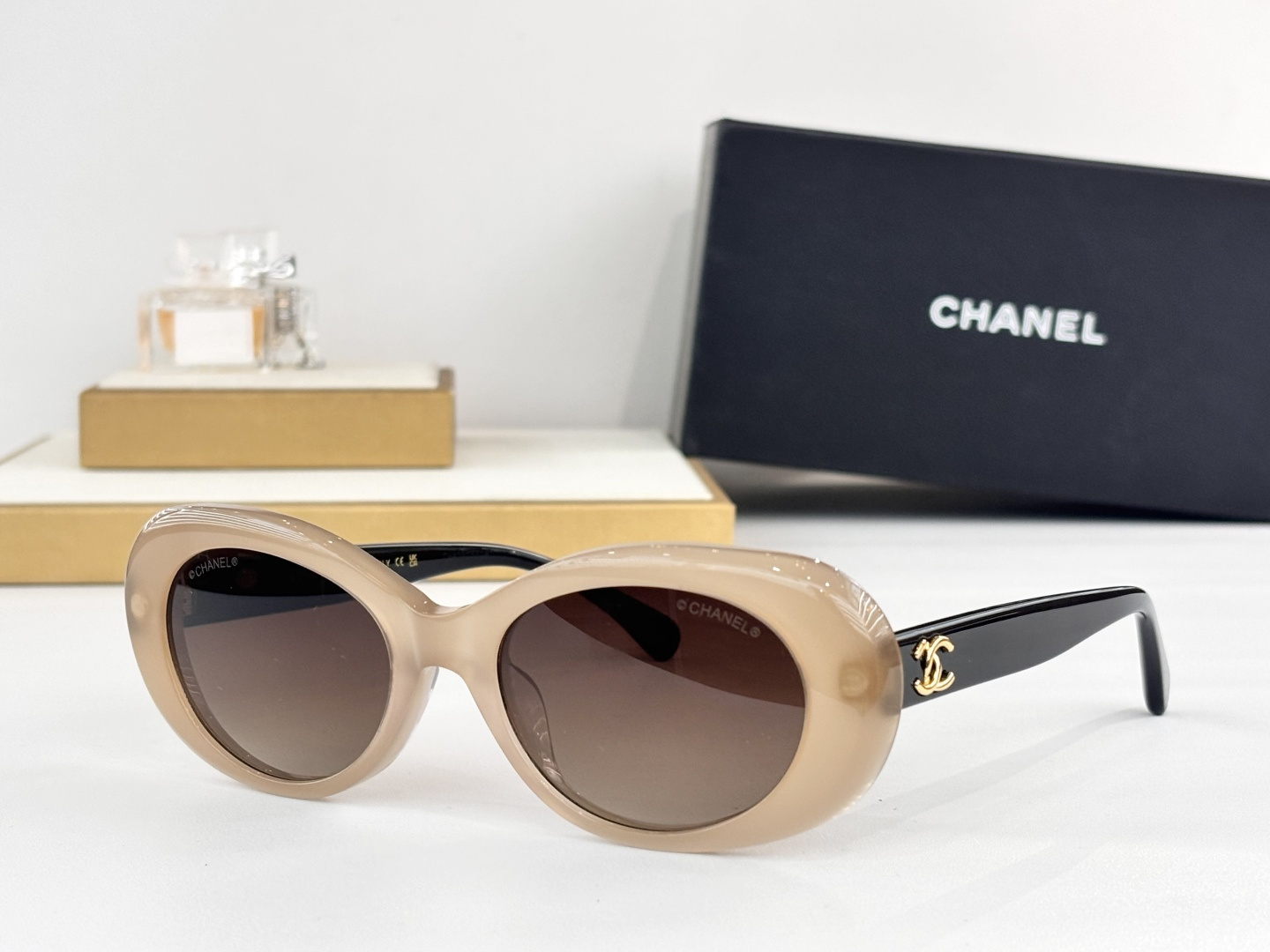 Chanel Luxury Oval Sunglasses - Elegant Women's Designer Eyewear