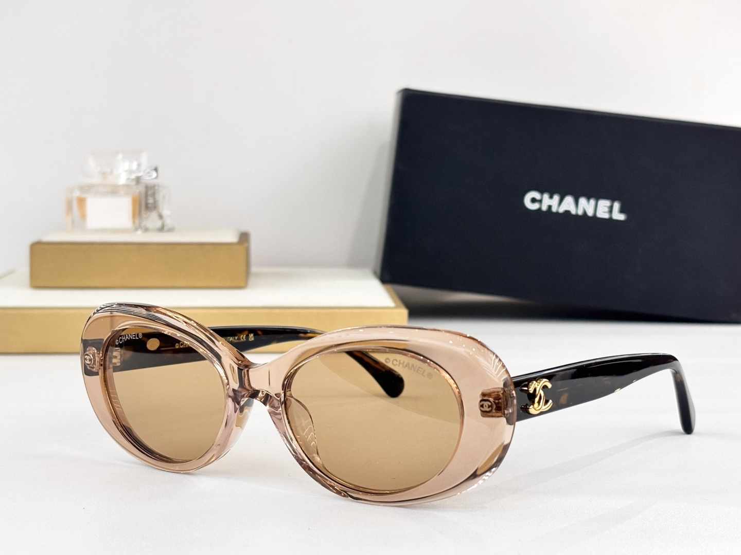 Chanel Luxury Oval Sunglasses - Elegant Women's Designer Eyewear