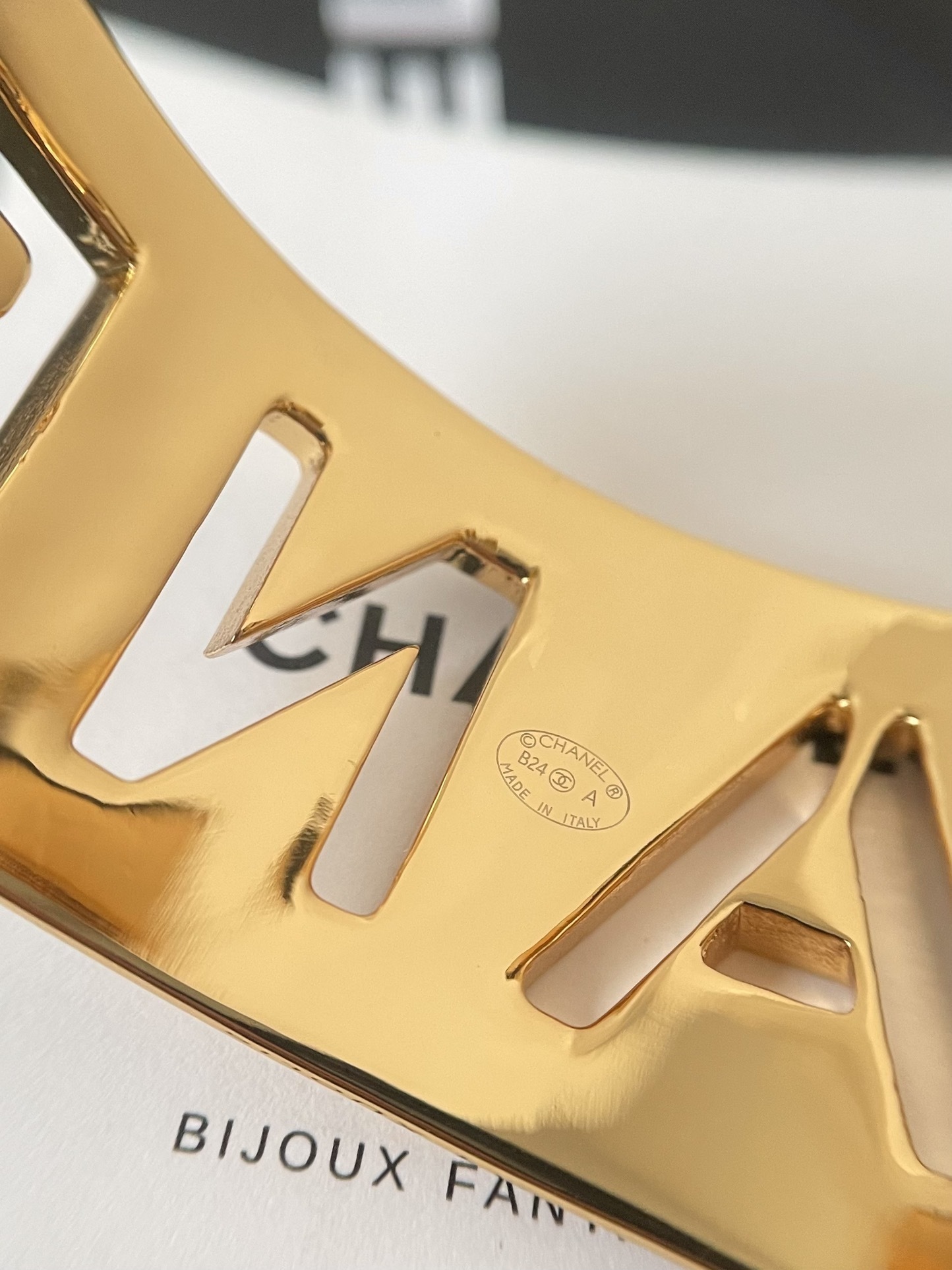 Chanel Luxury Gold-Tone Logo Cuff Bracelet with Black Enamel