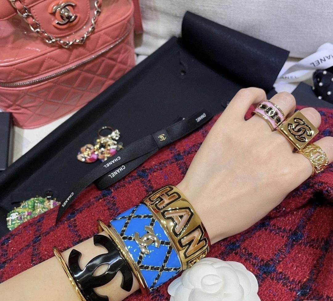 Chanel Luxury Gold-Tone Logo Cuff Bracelet with Black Enamel