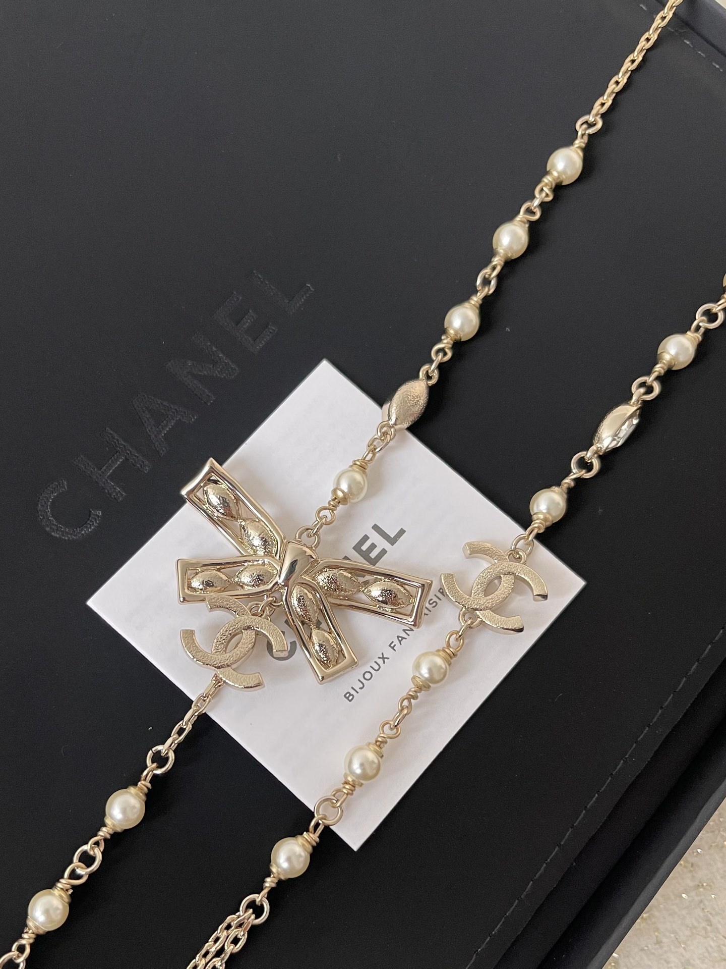 Elegant Crystal Bow & Pearl Long Necklace - Luxury Fashion Jewelry