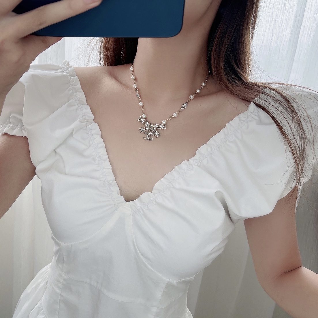 Chanel Crystal Bow Pearl Necklace - Elegant CC Logo Jewelry for Women