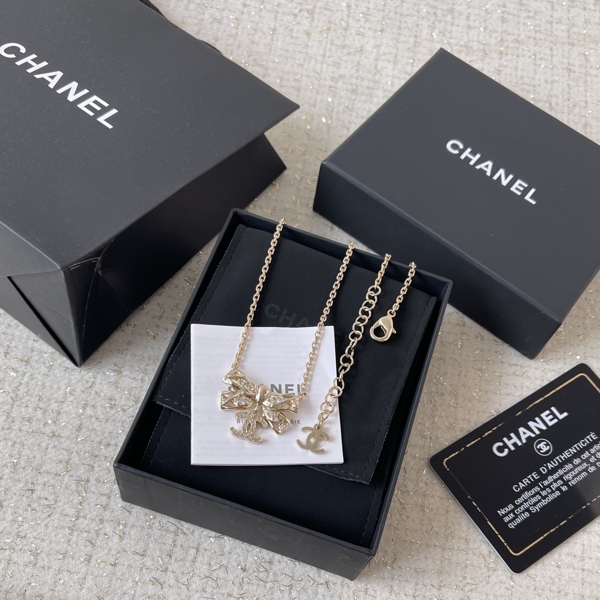 Luxury Gold Ribbon Bow Necklace with Crystal CC Logo Pendant