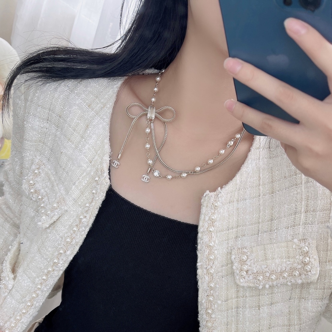 Elegant Double-Strand Pearl Necklace with Crystal Bow and CC Logo