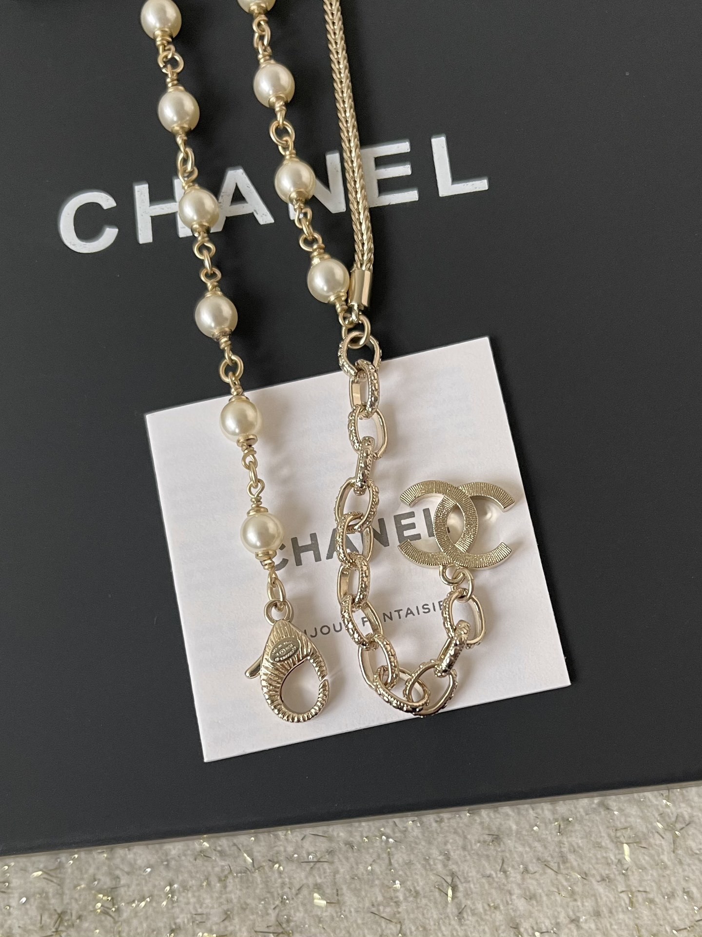 Elegant Double-Strand Pearl Necklace with Crystal Bow and CC Logo