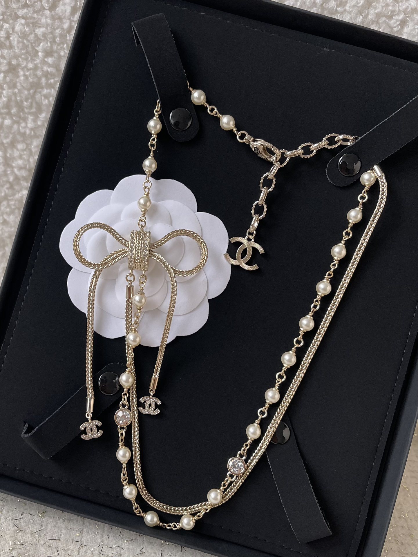 Elegant Double-Strand Pearl Necklace with Crystal Bow and CC Logo
