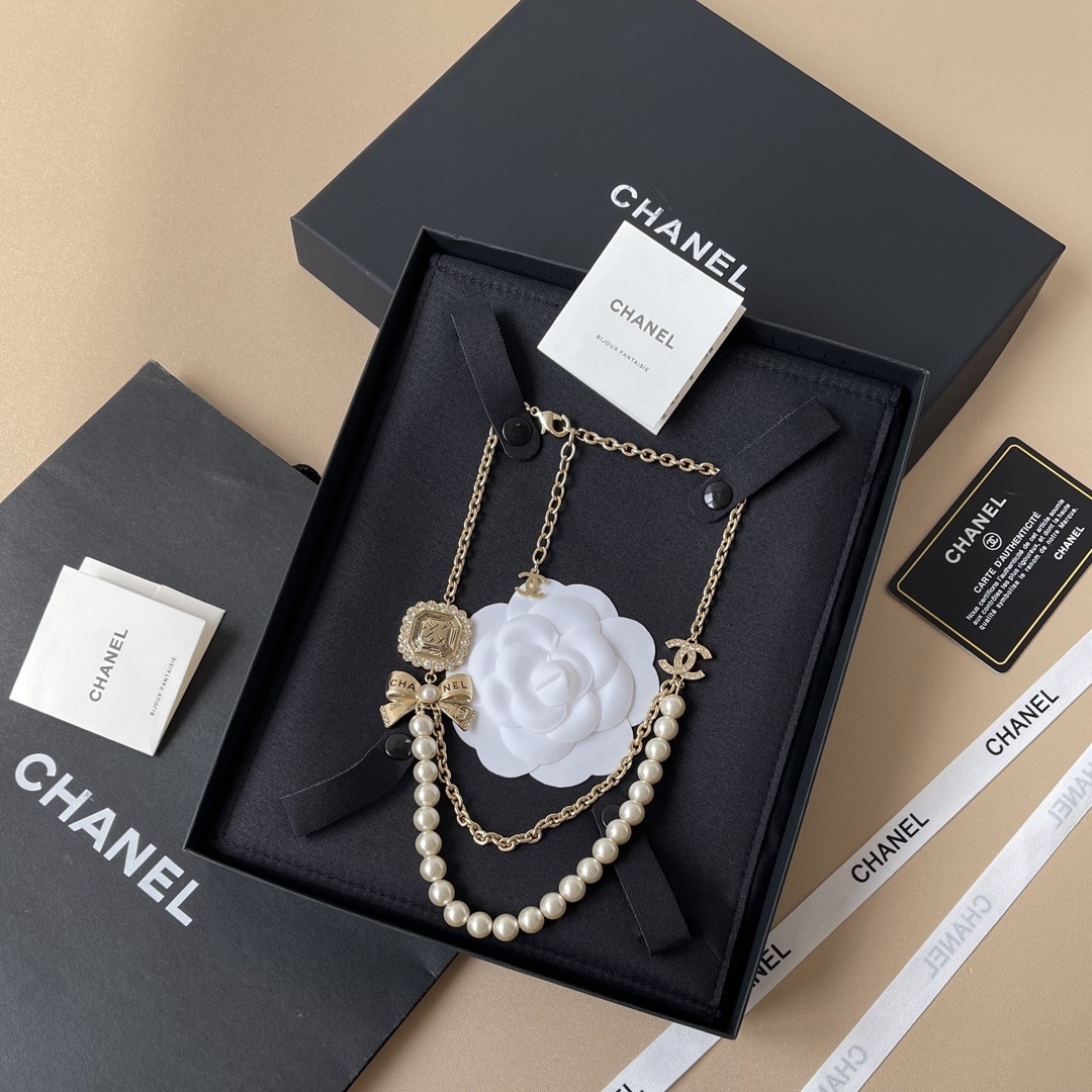 Luxury Chanel Gold Pearl Layered Necklace with Bow & CC Logo