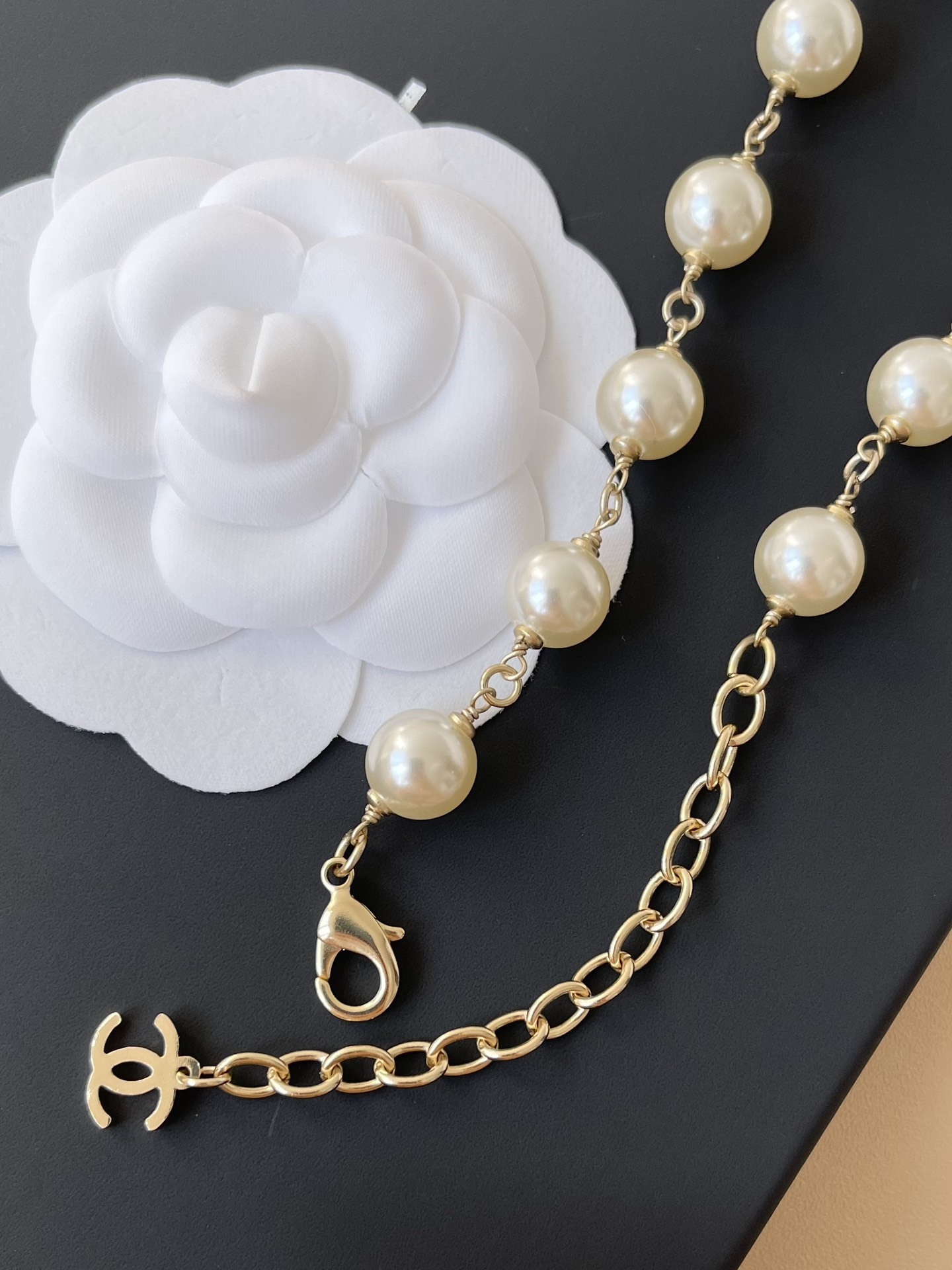 Luxury Long Pearl Necklace with Red Accents & Crystal CC Logo