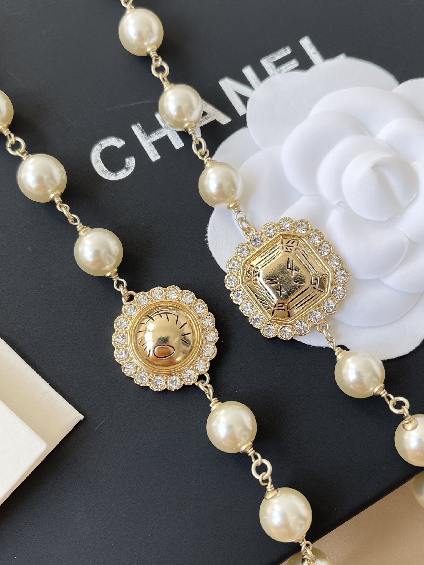 Luxury Long Pearl Necklace with Red Accents & Crystal CC Logo