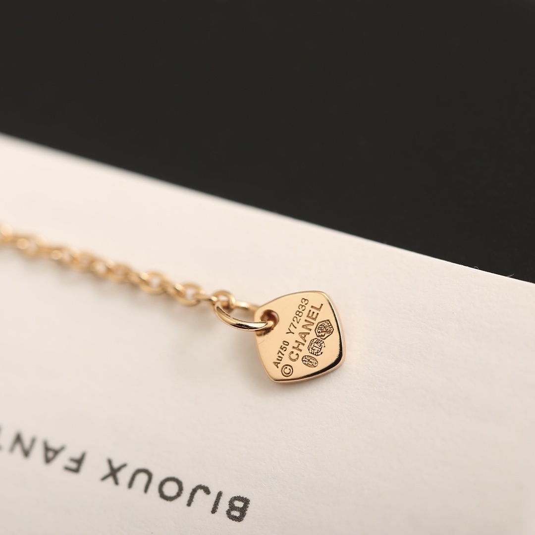 Luxury Rose Gold Quilted Crescent Necklace with Red Ruby Stone