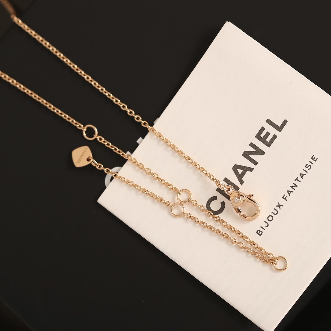 Luxury Rose Gold Quilted Crescent Necklace with Red Ruby Stone