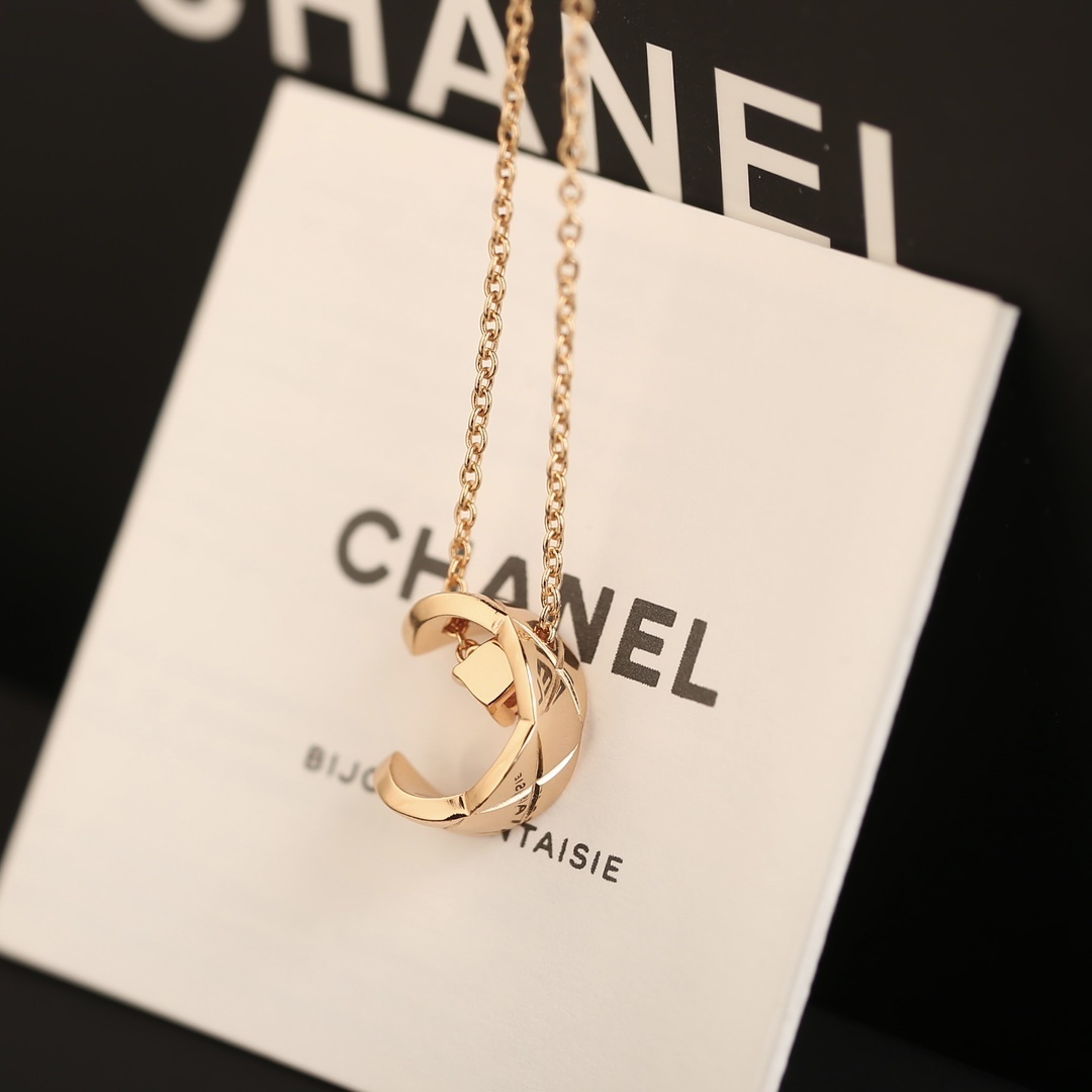 Luxury Rose Gold Quilted Crescent Necklace with Red Ruby Stone