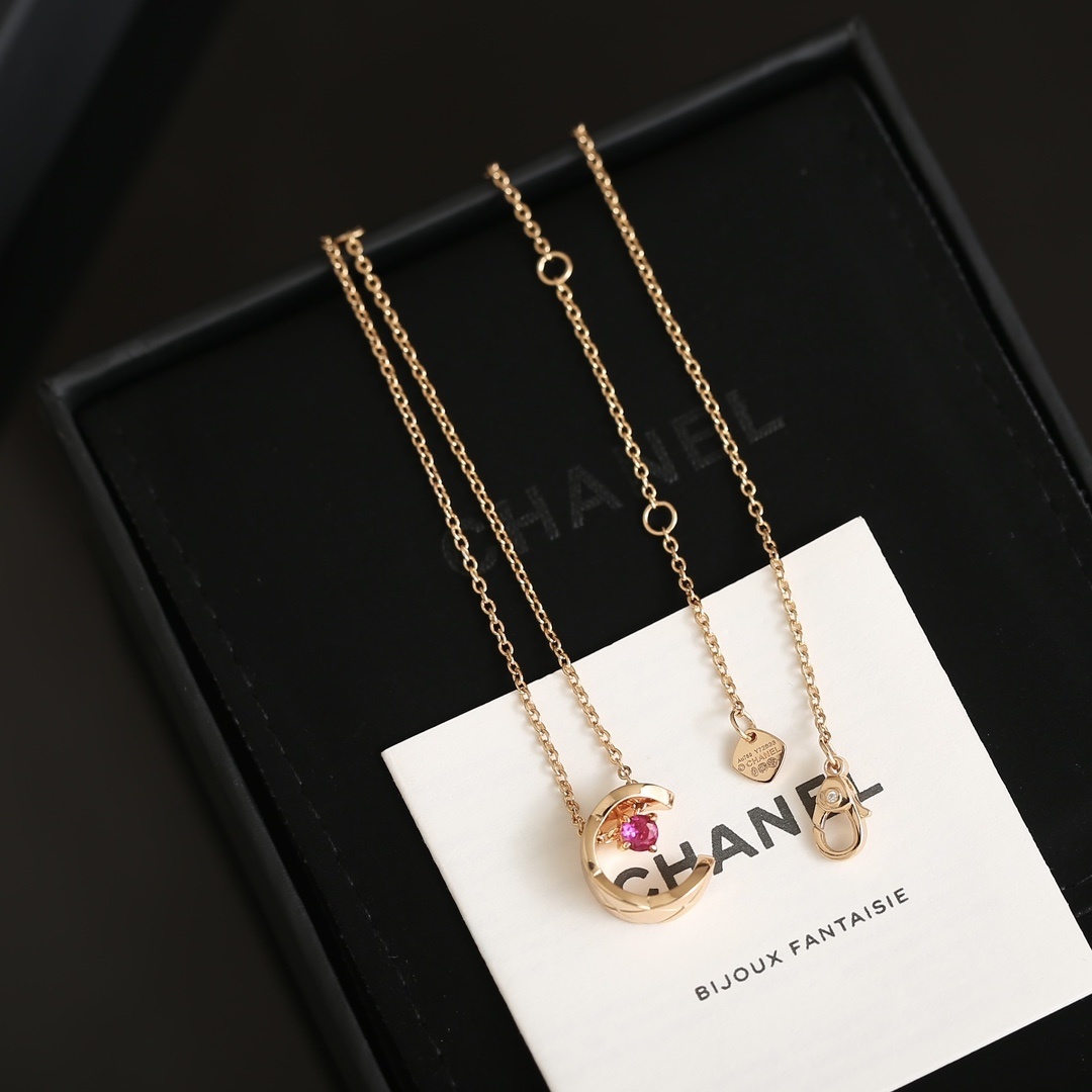 Luxury Rose Gold Quilted Crescent Necklace with Red Ruby Stone